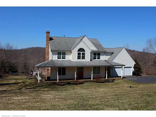 243 Mica Hill Road Durham, CT 06422 - Photo 1 of 1 a front view of a house with a yard