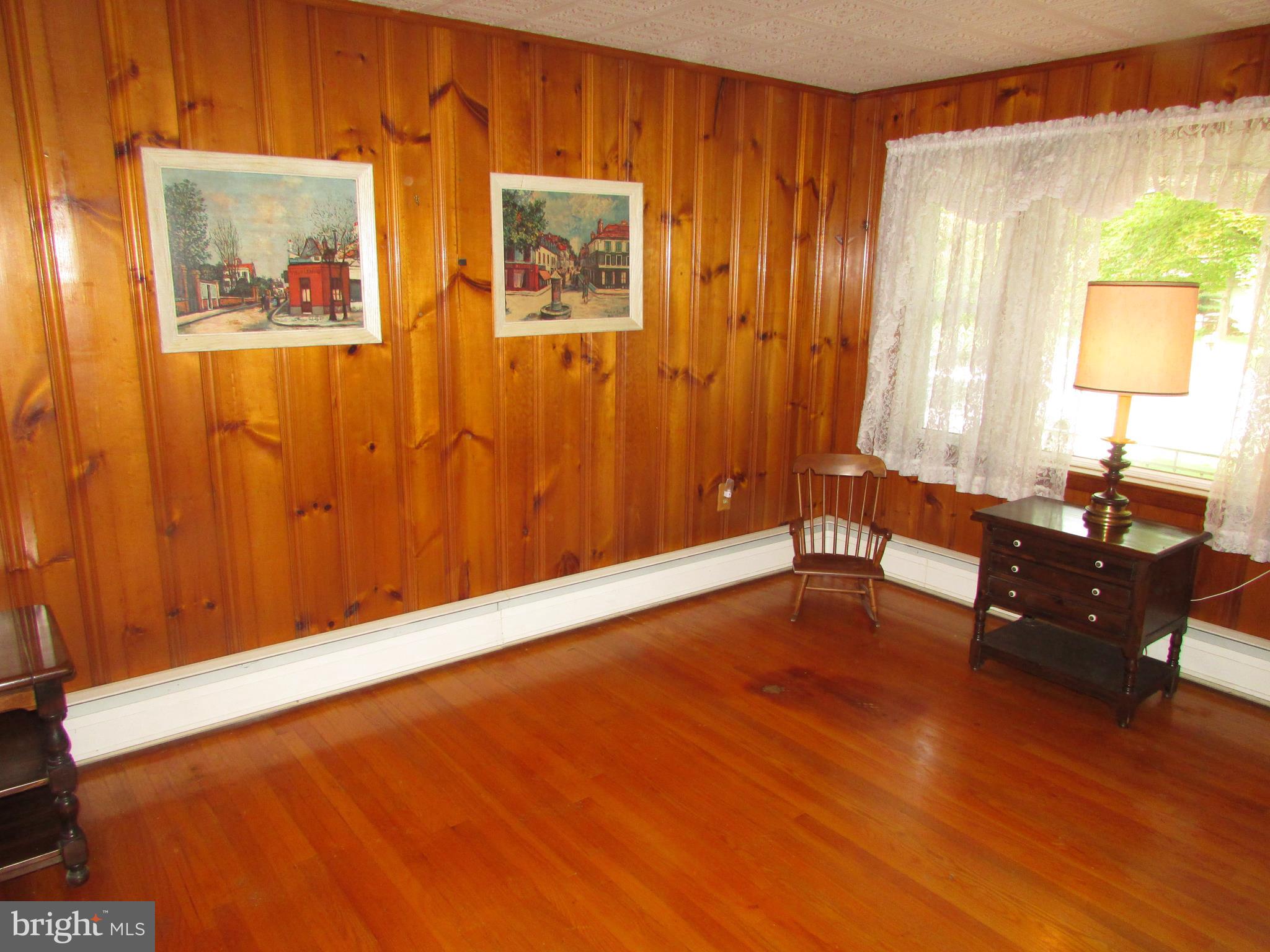 159 Upper Ferry Road Ewing, NJ 08618 - Photo 3 of 30 Living room with knotty pine walls
