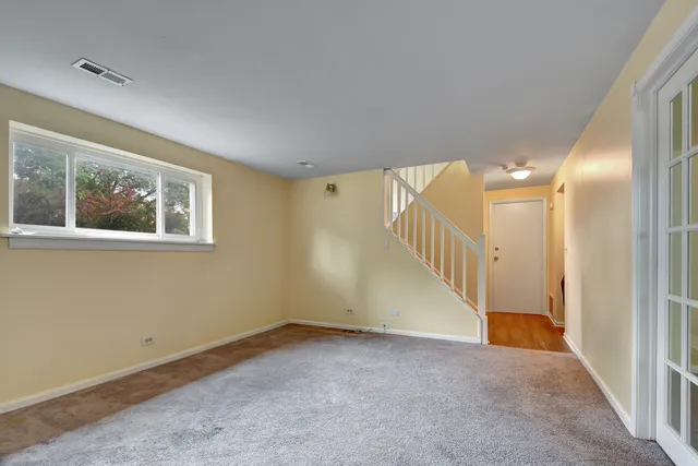 a view of a hallway with entryway