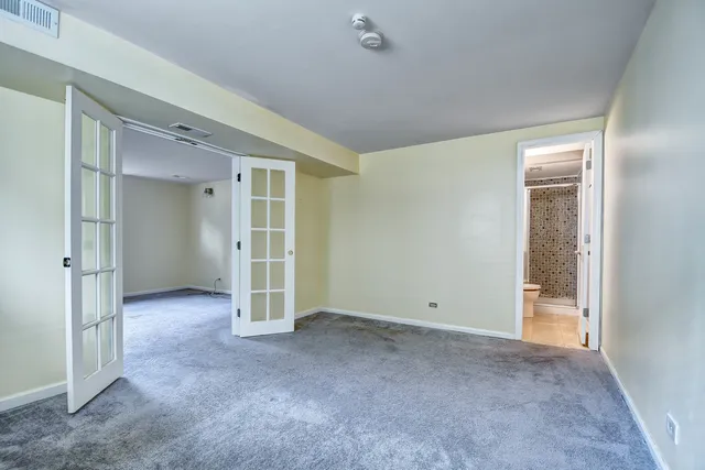 an empty room with a natural light