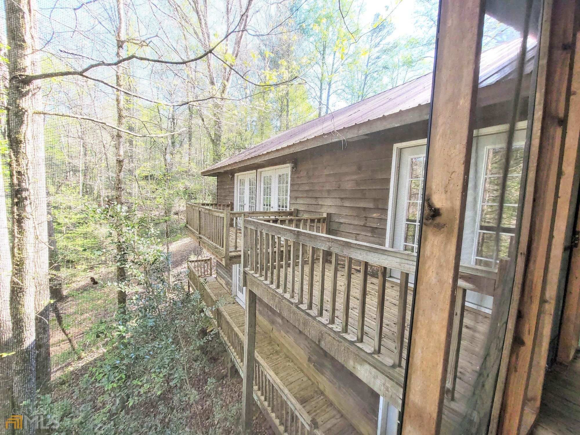 1101 River Road Cleveland, GA 30528 - Photo 1 of 1 a view of a balcony with a tree