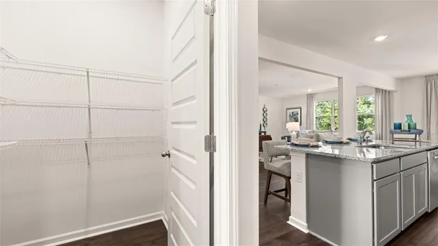 a view of a room that has a bed