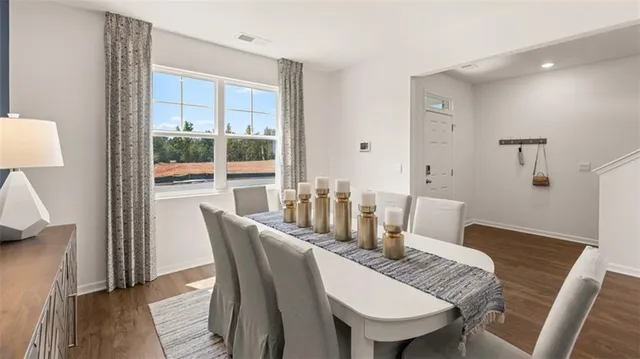 a kitchen with stainless steel appliances granite countertop a stove and a refrigerator
