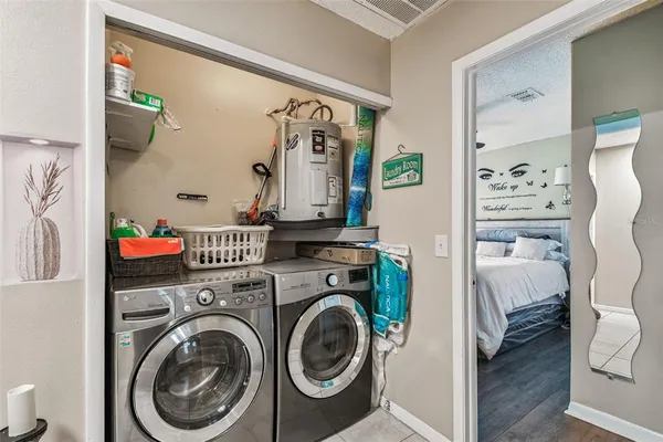 a utility room with dryer and washer