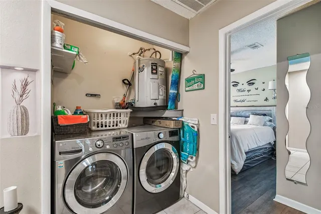 a utility room with dryer and washer
