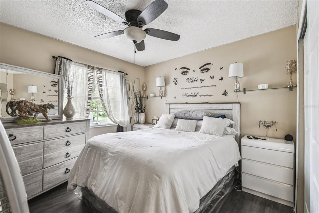 7902 North 14th Street Tampa, FL 33604 - Photo 9 of 25 a bedroom with a bed and a window