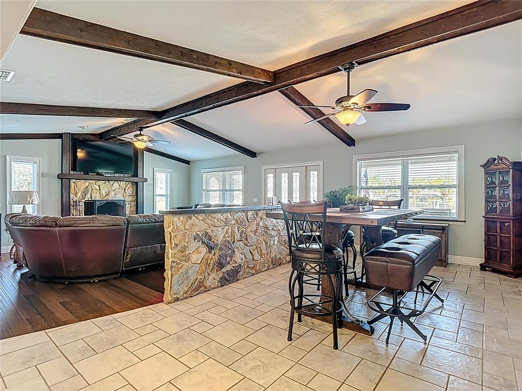5904 Springrun Court Holiday, FL 34690 - Photo 18 of 79 a view of a dining room with furniture and window