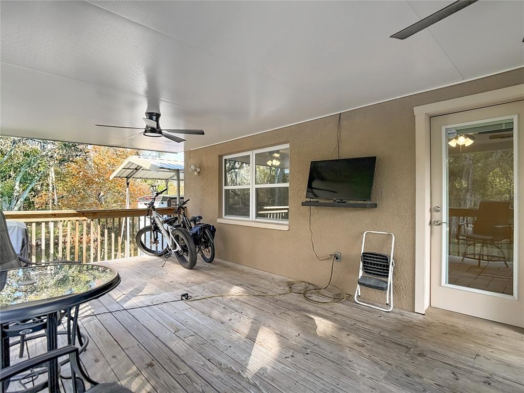 5904 Springrun Court Holiday, FL 34690 - Photo 56 of 79 a view of a livingroom with furniture window and wooden floor