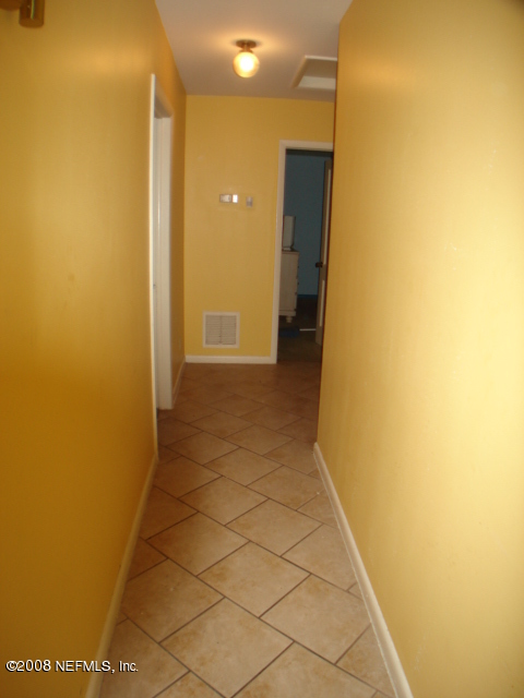 1010 Ald Road Jacksonville, FL 32211 - Photo 8 of 13 TILED HALLWAY TO BEDROOMS