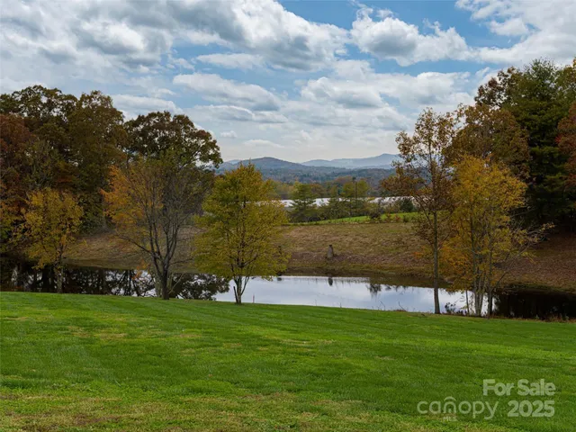 a view of a golf course with a lake