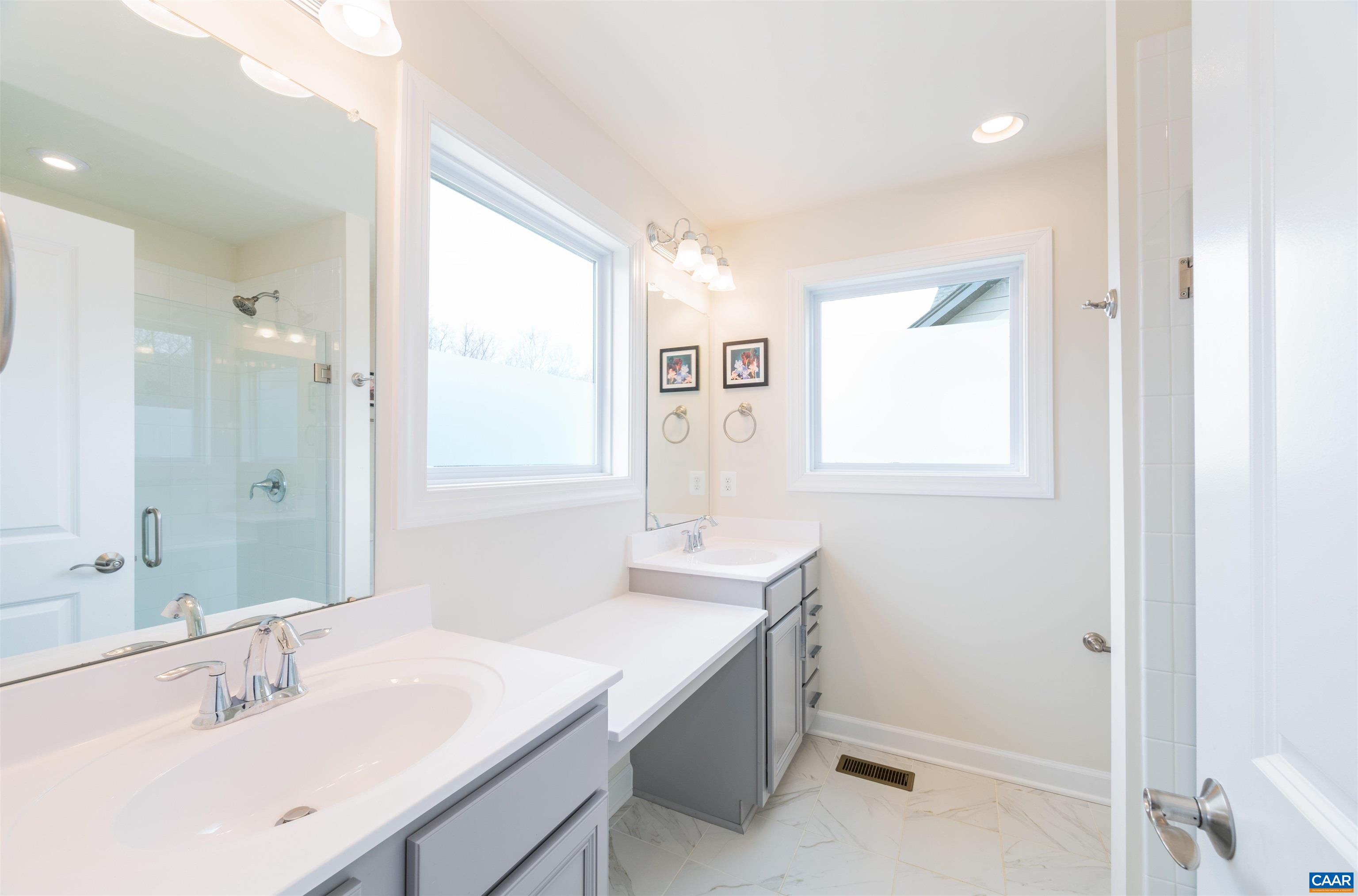 3171 Horizon Road Charlottesville, VA 22902 - Photo 3 of 45 a bathroom with a sink and a mirror