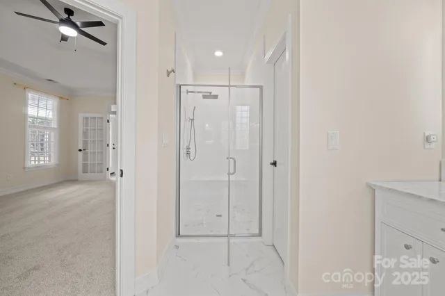 a view of a hallway with closet and entryway