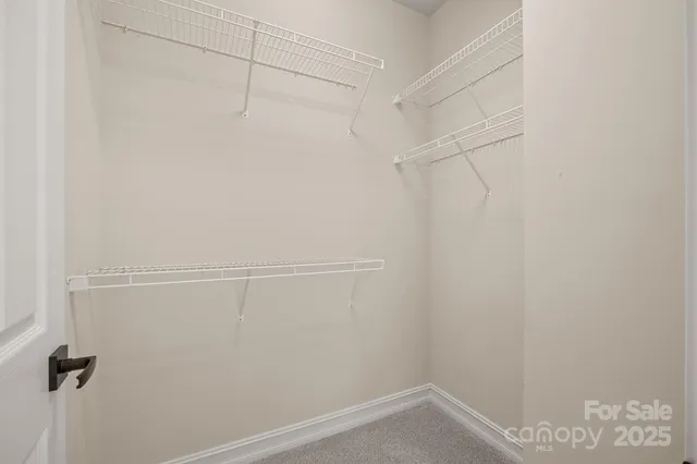 a view of small space with racks on the wall