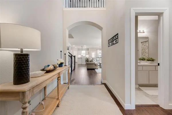 a view of a living room and entryway