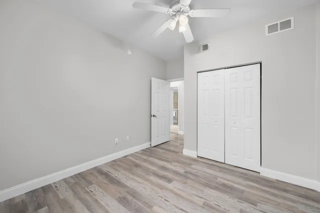 a view of a room with a fan