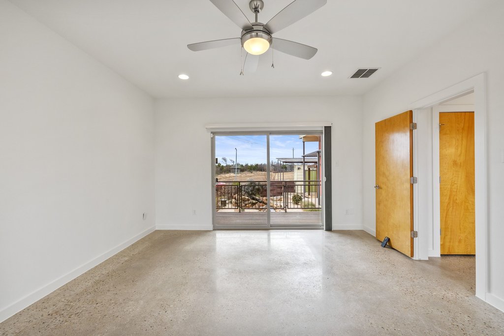 7412 Ava Lane Austin, TX 78724 - Photo 11 of 28 Spare room featuring ceiling fan and recessed lighting