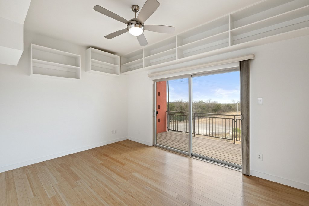 7412 Ava Lane Austin, TX 78724 - Photo 16 of 28 Empty room featuring light wood finished floors and ceiling fan