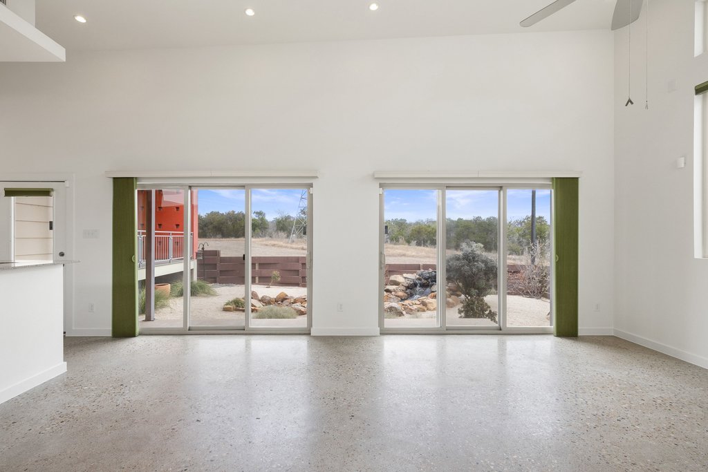 7412 Ava Lane Austin, TX 78724 - Photo 8 of 28 Living room looking out onto front courtyard
