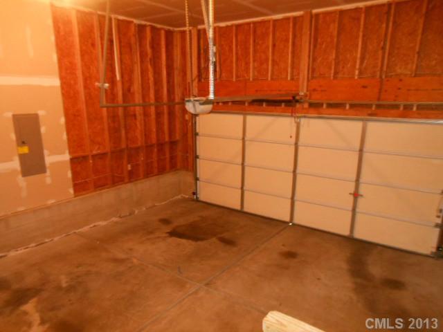 4513 Hyperion Court Charlotte, NC 28216 - Photo 15 of 16 a view of a room with racks on the wall