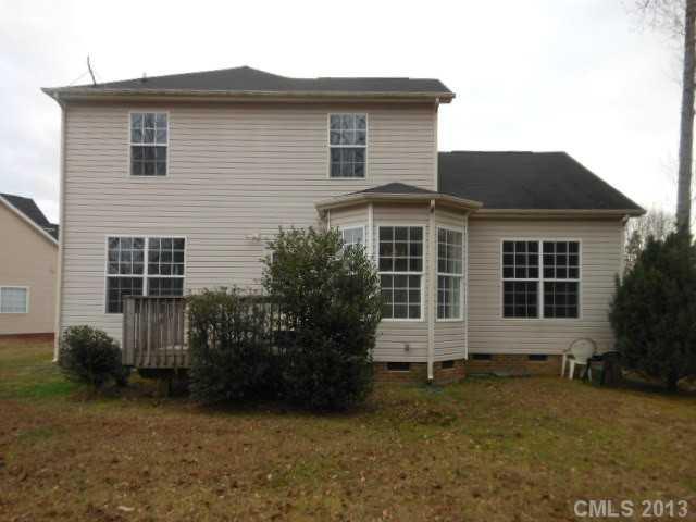 4513 Hyperion Court Charlotte, NC 28216 - Photo 16 of 16 front view of a house with a yard