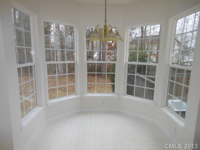 4513 Hyperion Court Charlotte, NC 28216 - Photo 6 of 16 a view of an empty room with a window