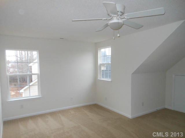 4513 Hyperion Court Charlotte, NC 28216 - Photo 10 of 16 an empty room with a window