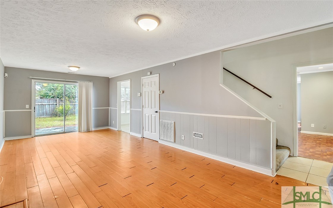 128 North Leeds Gate Road Savannah, GA 31406 - Photo 2 of 24 Living Room to left of entry way