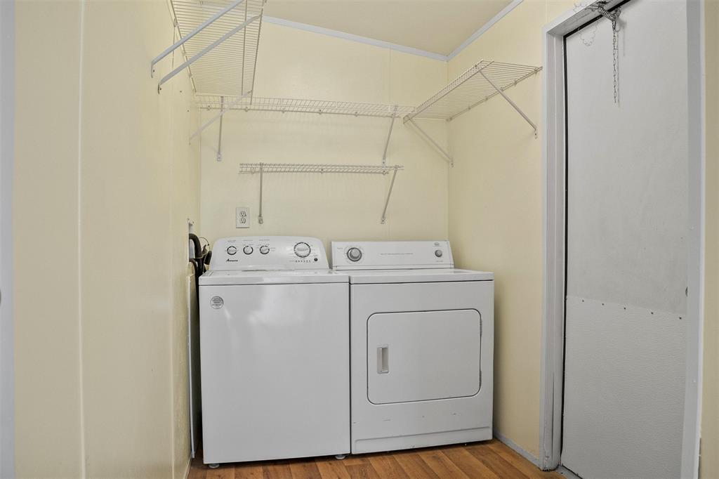 242 Private Road 4732 Rhome, TX 76078 - Photo 24 of 33 a utility room with dryer and washer