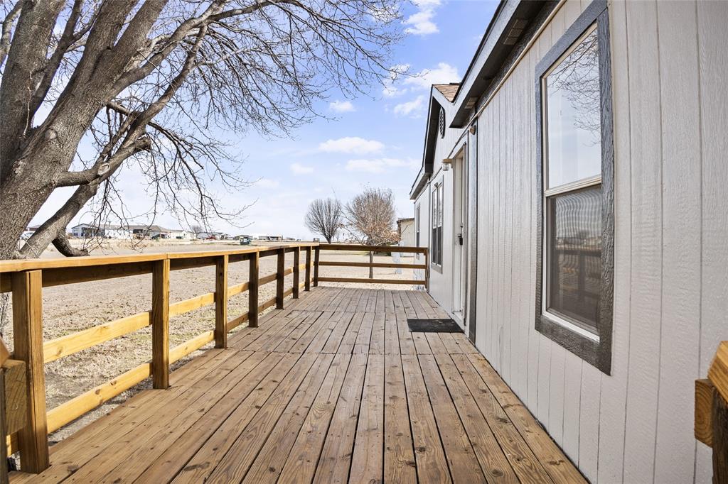 242 Private Road 4732 Rhome, TX 76078 - Photo 27 of 33 a view of balcony with wooden floor