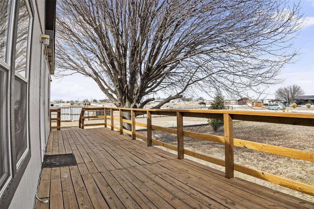 242 Private Road 4732 Rhome, TX 76078 - Photo 28 of 33 a view of outdoor space with wooden deck