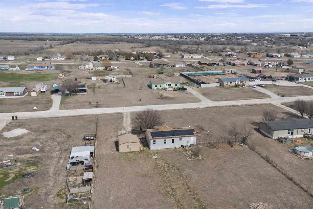 242 Private Road 4732 Rhome, TX 76078 - Photo 33 of 33 an aerial view of a city with lots of residential buildings