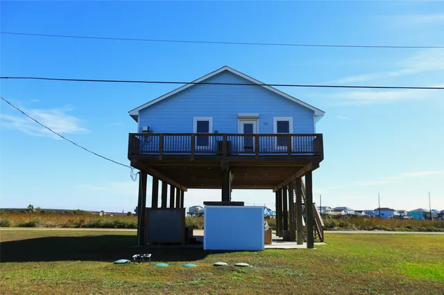 a view of house with ocean view