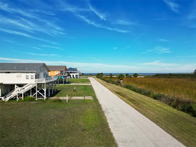 a view of a swimming pool with an ocean view