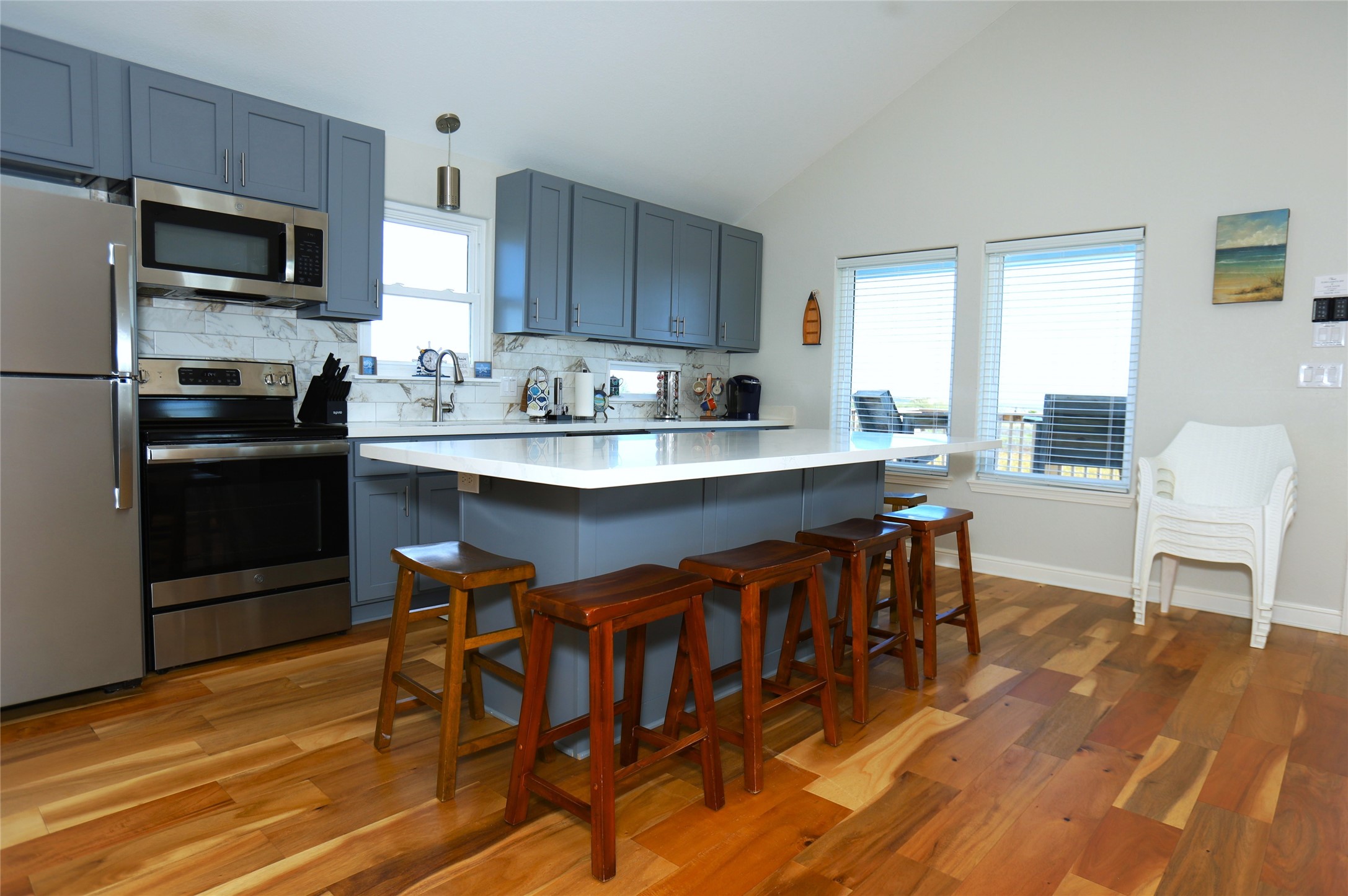 131 Pieces Of 8 Freeport, TX 77541 - Photo 36 of 43 a kitchen with stainless steel appliances granite countertop a table chairs microwave and sink