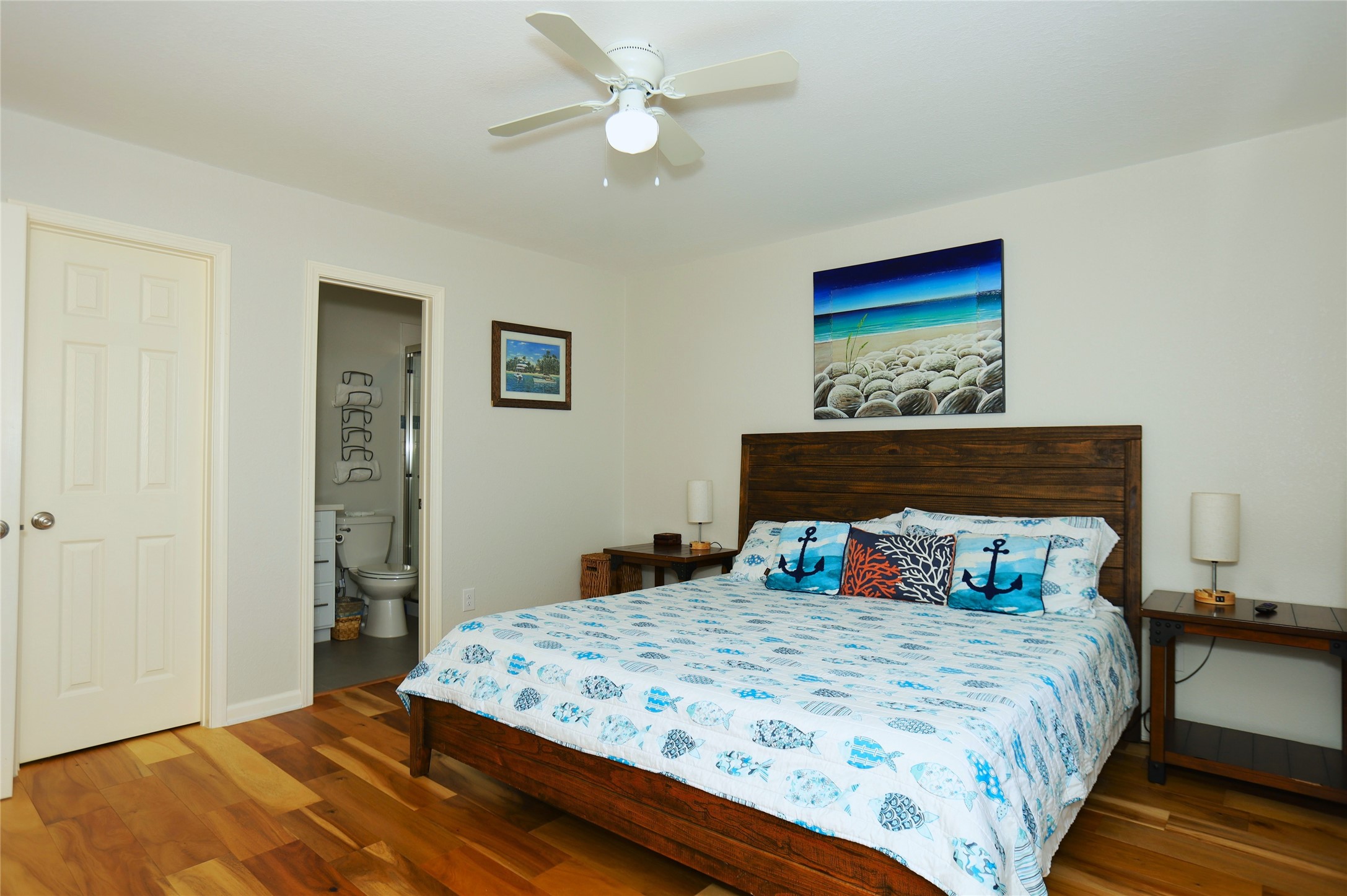 131 Pieces Of 8 Freeport, TX 77541 - Photo 38 of 43 a bedroom with a bed and a painting on the wall