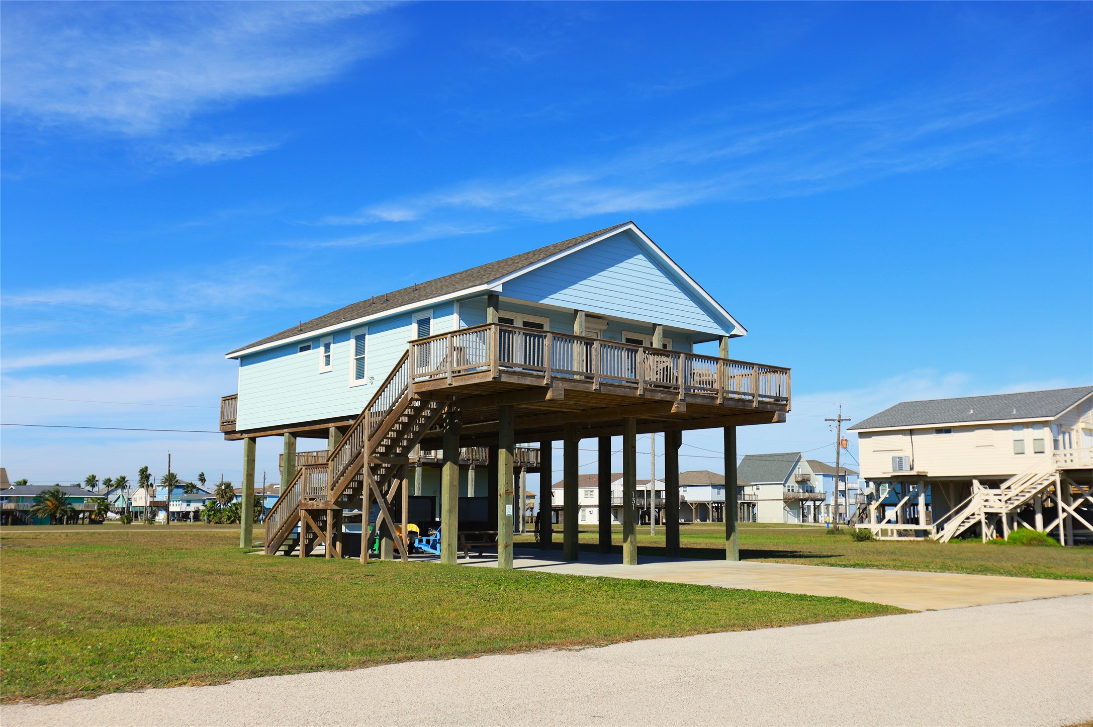 131 Pieces Of 8 Freeport, TX 77541 - Photo 5 of 43 a front view of a house with a yard
