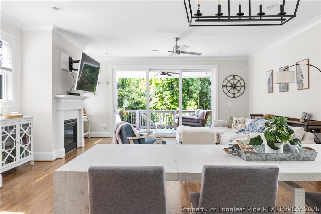 398 Carolina Avenue Raleigh, NC 27606 - Photo 12 of 50 a living room with fireplace furniture and a flat screen tv