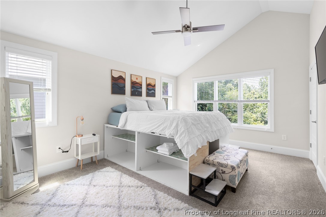 398 Carolina Avenue Raleigh, NC 27606 - Photo 37 of 50 a living room with furniture and a large window