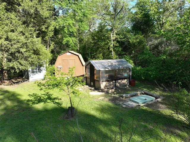 a garden view with a seating space