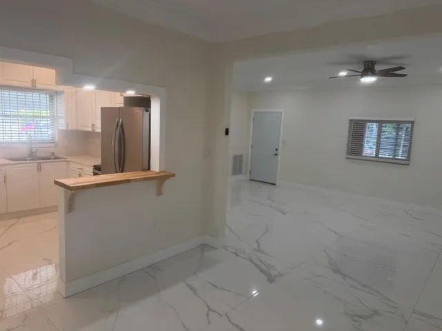 an empty room with windows