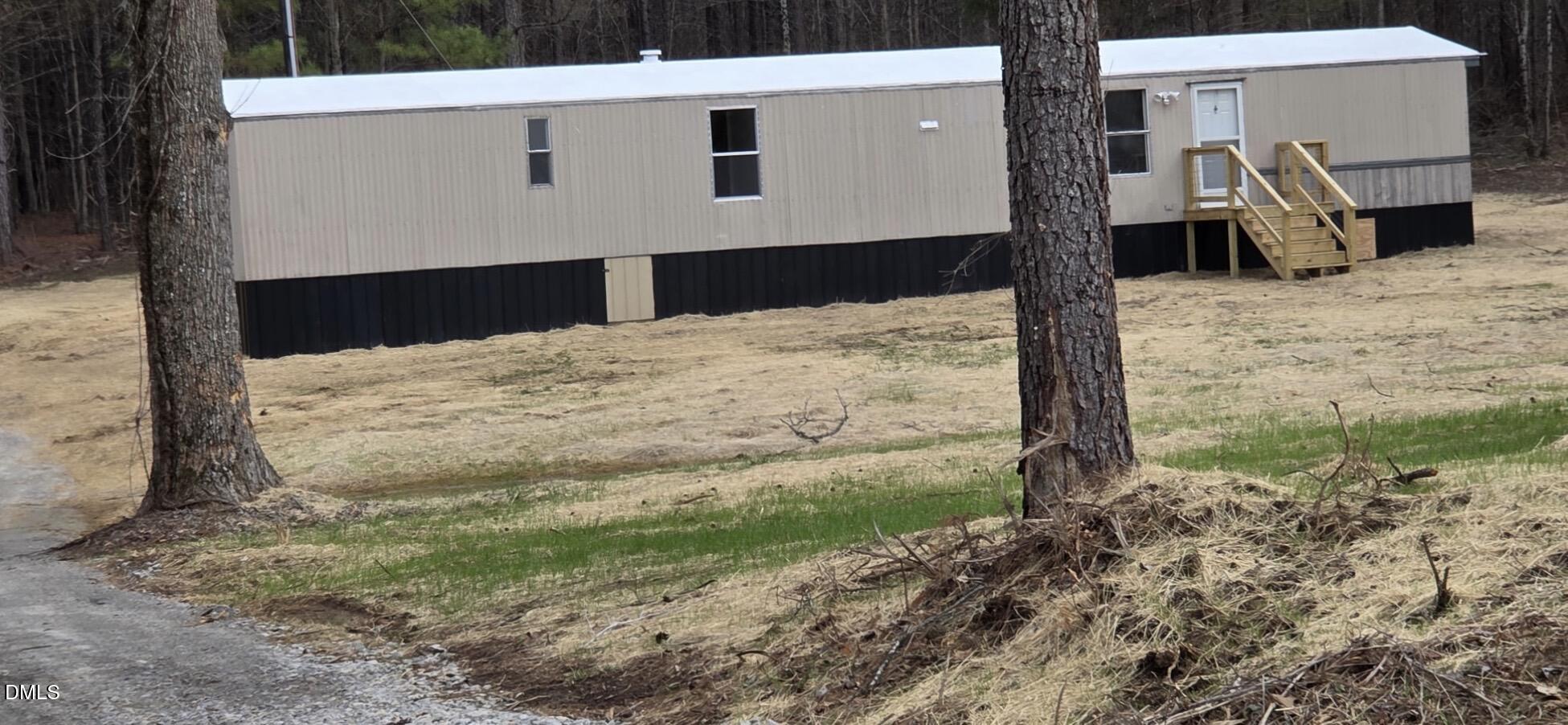 1071 Davis Bugg Road Warrenton, NC 27589 - Photo 2 of 13 a view of a backyard of the house