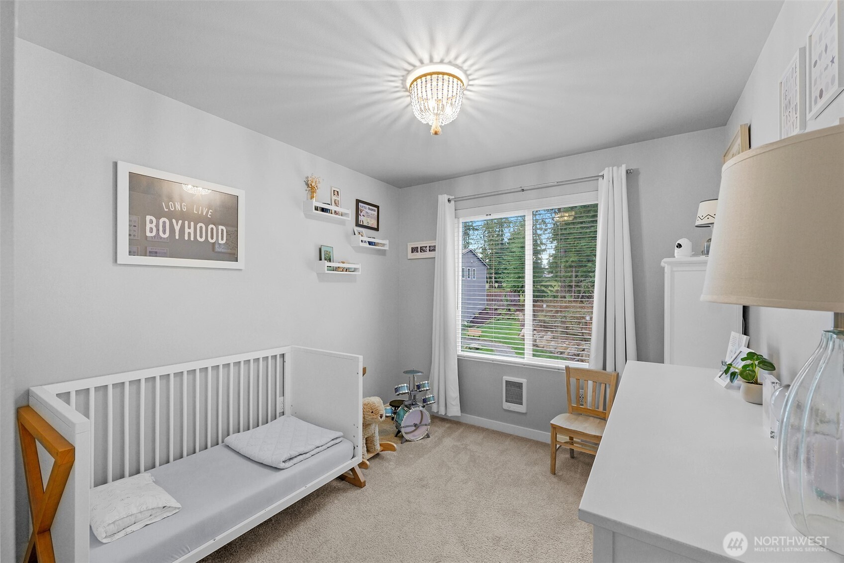 2012 101st Avenue Southeast, Unit 2 Lake Stevens, WA 98258 - Photo 24 of 33 a living room with furniture and a large window