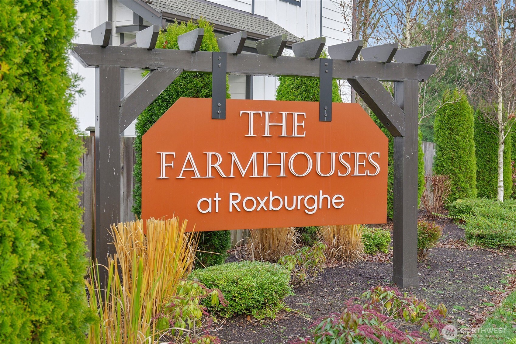 2012 101st Avenue Southeast, Unit 2 Lake Stevens, WA 98258 - Photo 33 of 33 a sign broad in front of the red brick house