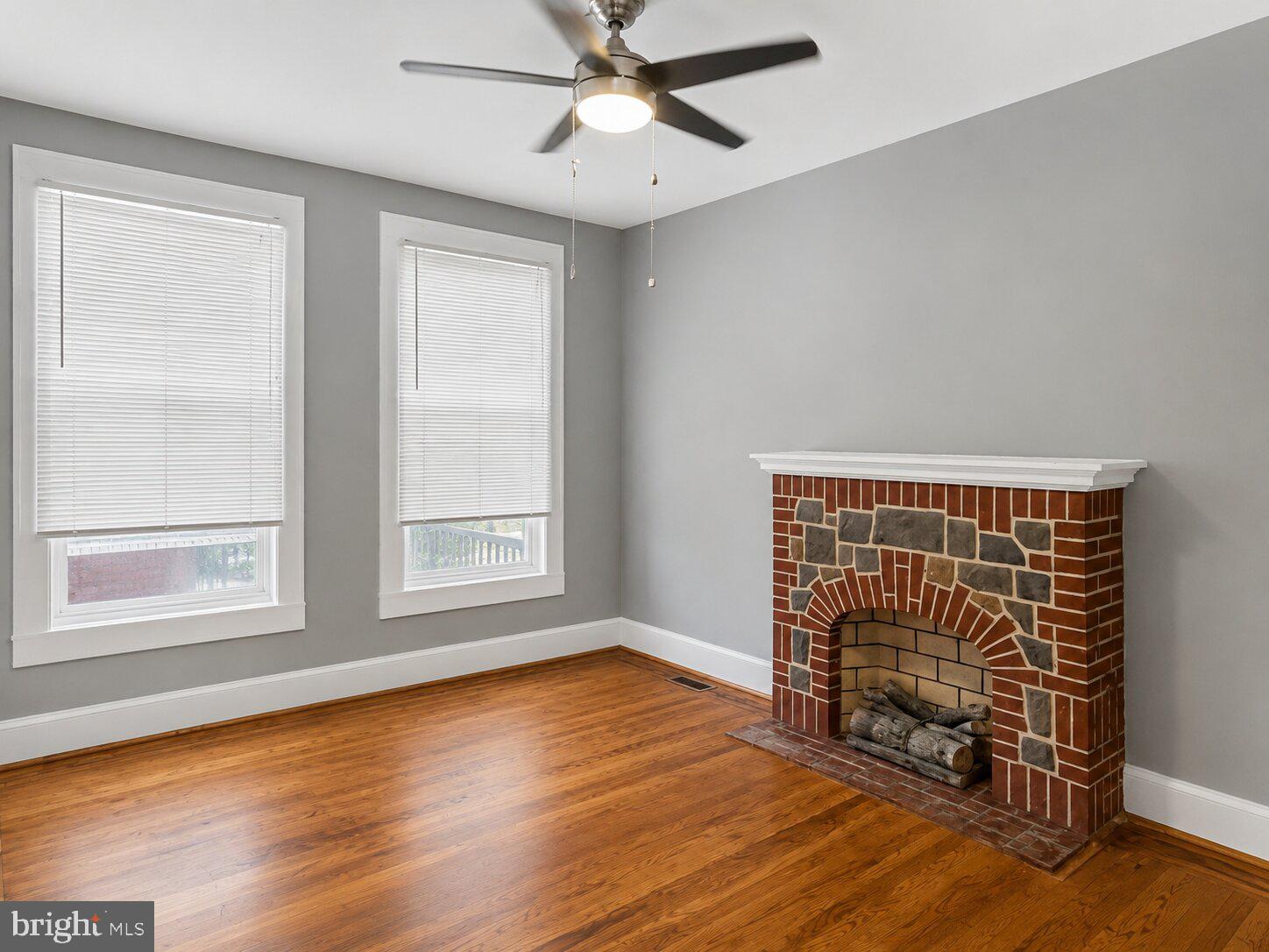2960 Harford Road Baltimore, MD 21218 - Photo 10 of 10 Cozy room with classic brick fireplace.