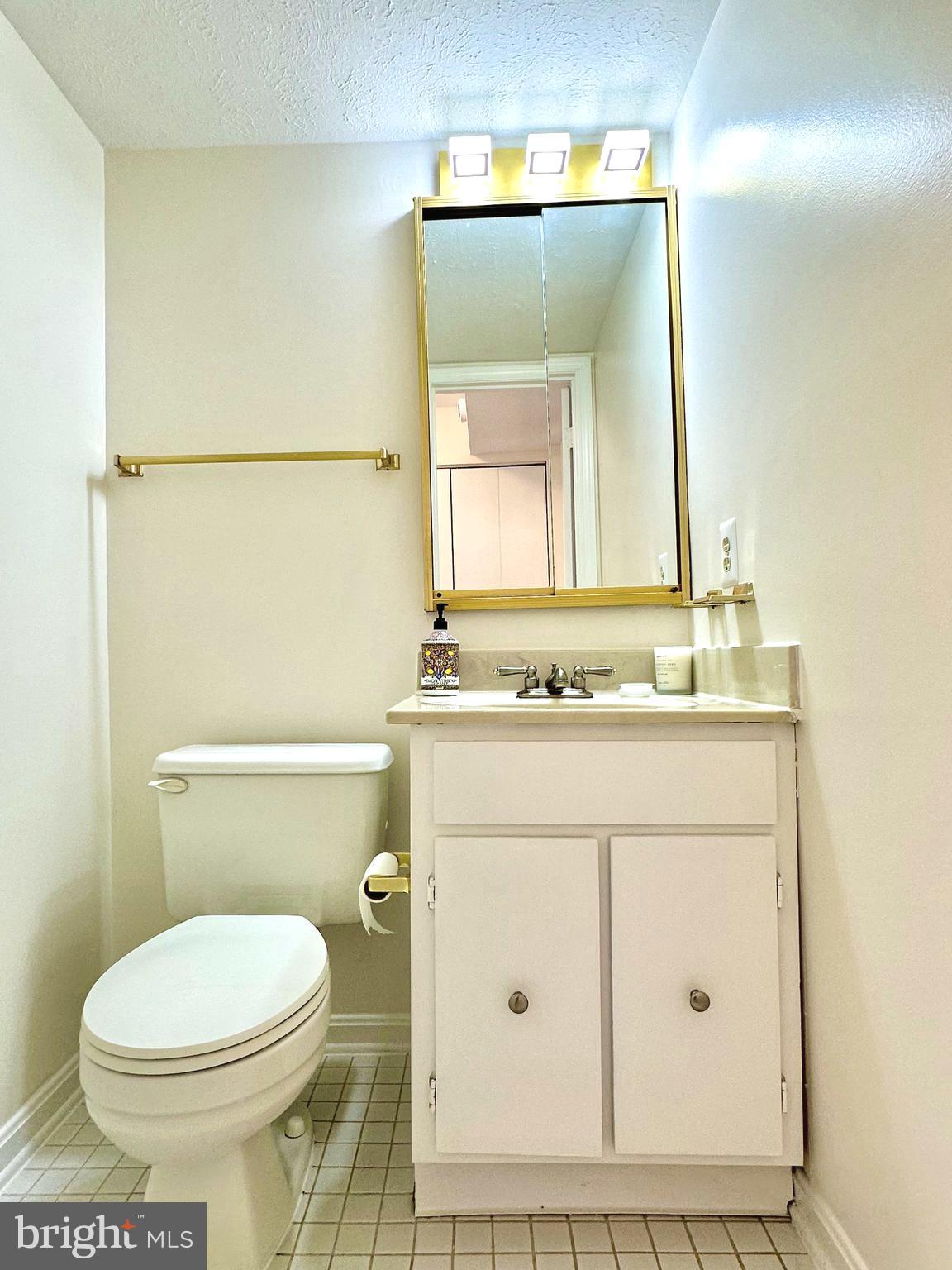 19617 Rhinestone Drive Germantown, MD 20874 - Photo 29 of 30 Powder room has new light fixtures