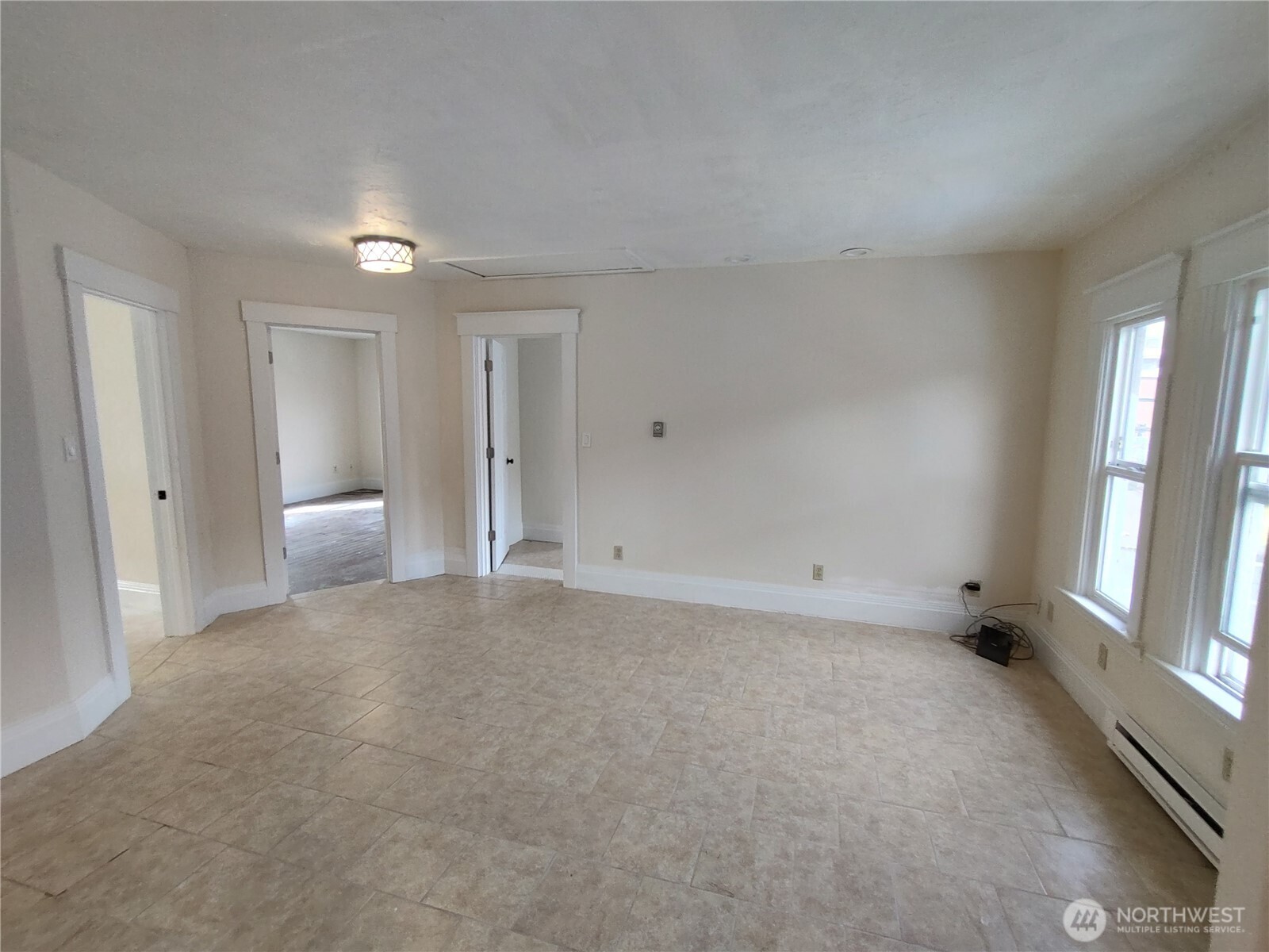 316 North F Street Aberdeen, WA 98520 - Photo 17 of 40 a view of an empty room with a window