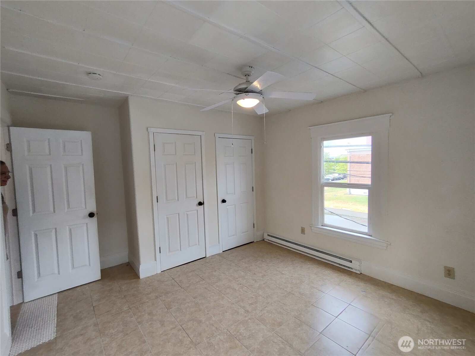 316 North F Street Aberdeen, WA 98520 - Photo 22 of 40 a view of an empty room with a window