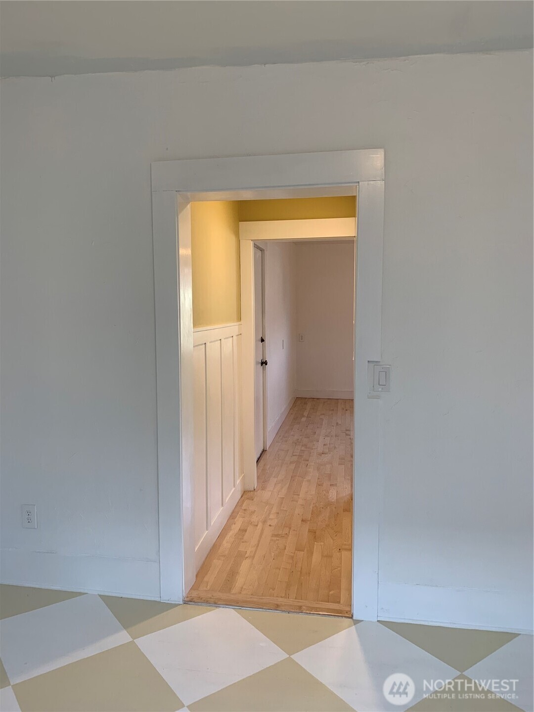316 North F Street Aberdeen, WA 98520 - Photo 28 of 40 a view of a hallway with wooden floor