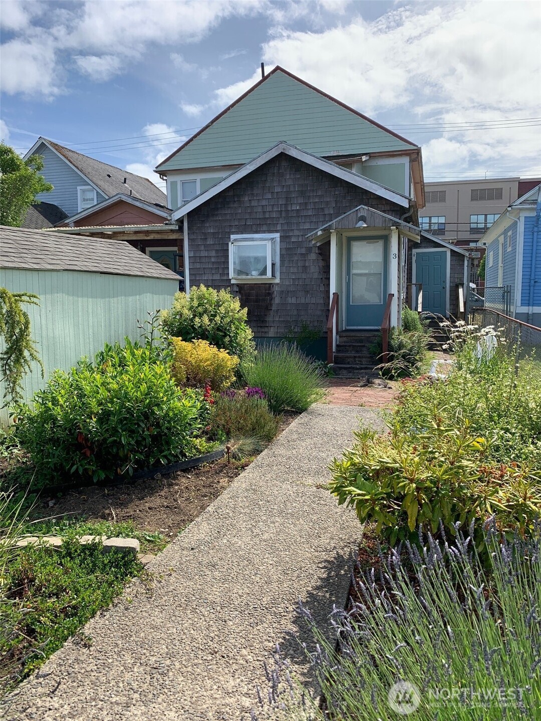 316 North F Street Aberdeen, WA 98520 - Photo 35 of 40 a front view of a house with garden