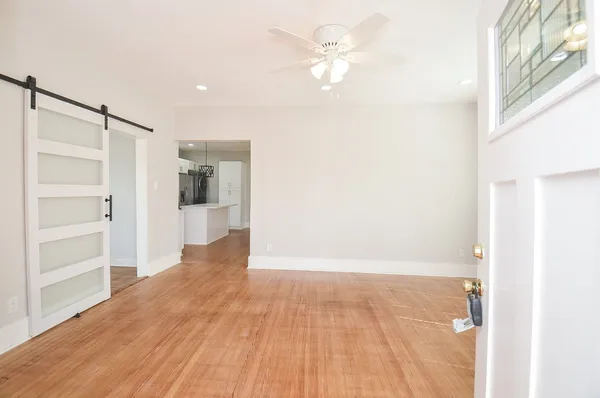 a view of an empty room with a window